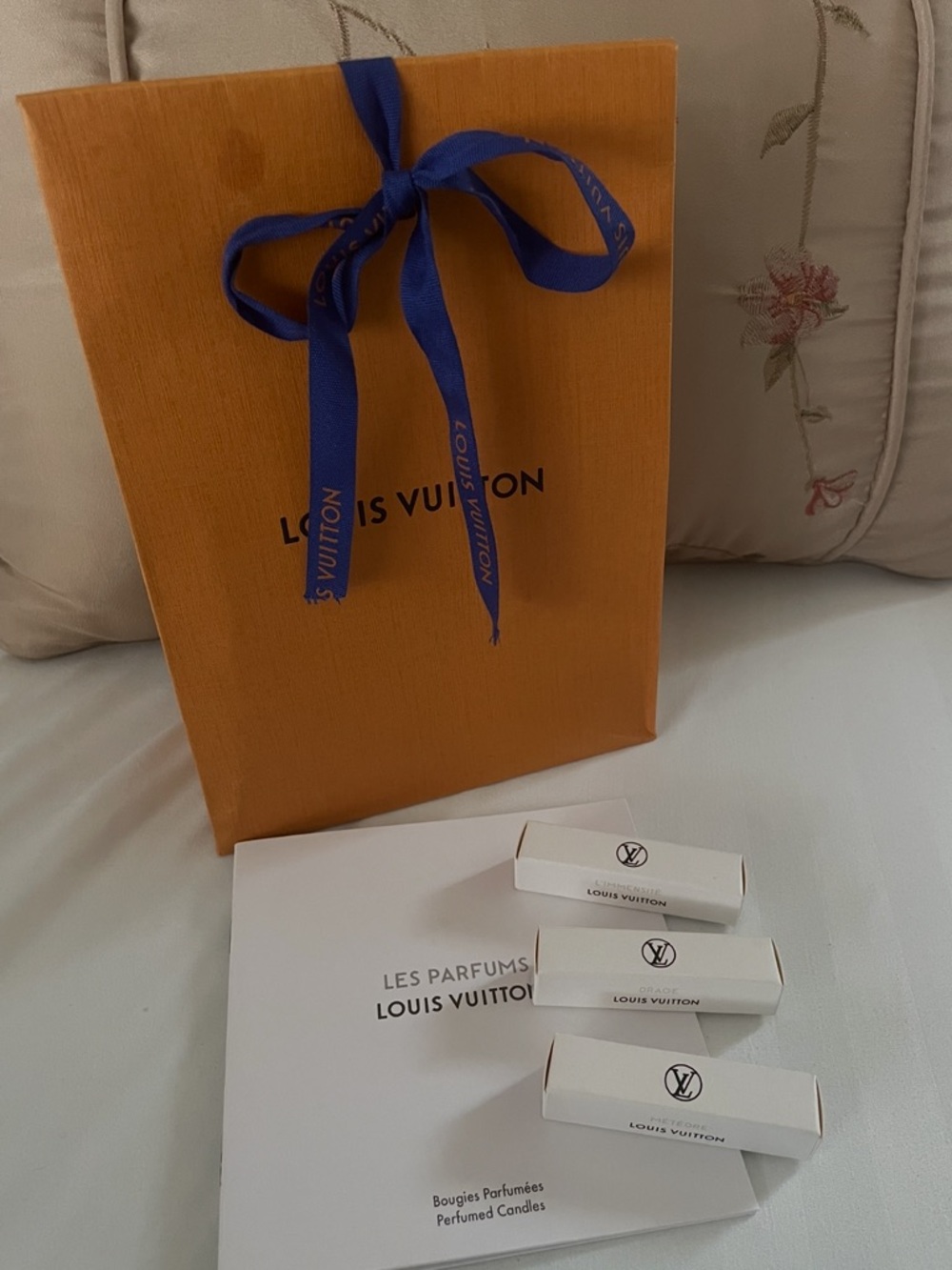 Louis Vuitton Gift Bag with three luxury samples fragrance.